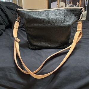 Elegant Consuela Black and Tan Leather Shoulder Bag